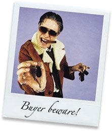 Polaroid of a Del Boy-type trader with the words "Buyer beware!"