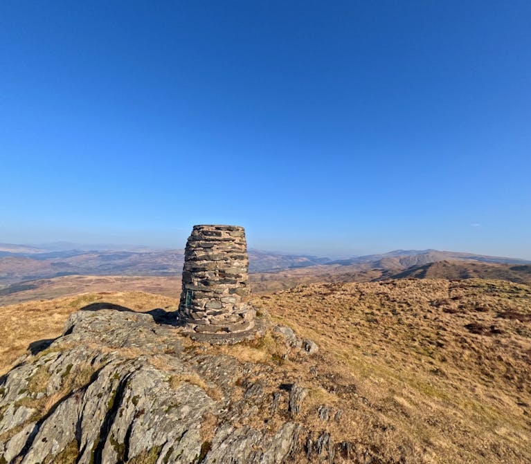 Landscape in Eryri National Park (Snowdonia) including trig point