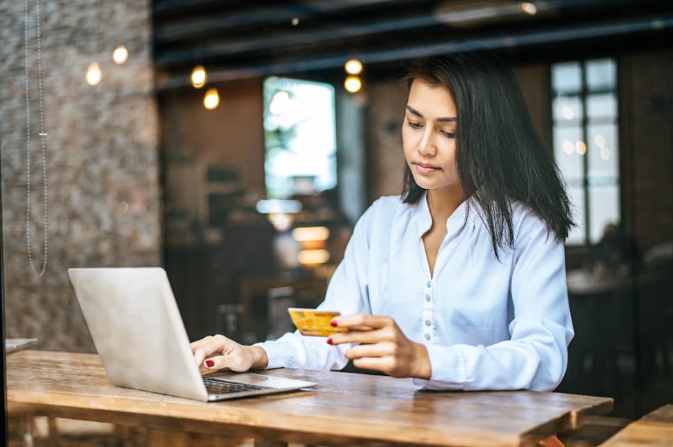 igd-credit-limit-too-low-hero-coffee-shop-window-card-laptop.jpg