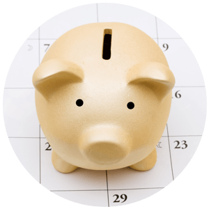 Piggy bank on a calendar.