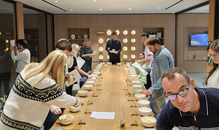 An image of the MSE Team, engrossed in eating salt n vinegar crisps.
