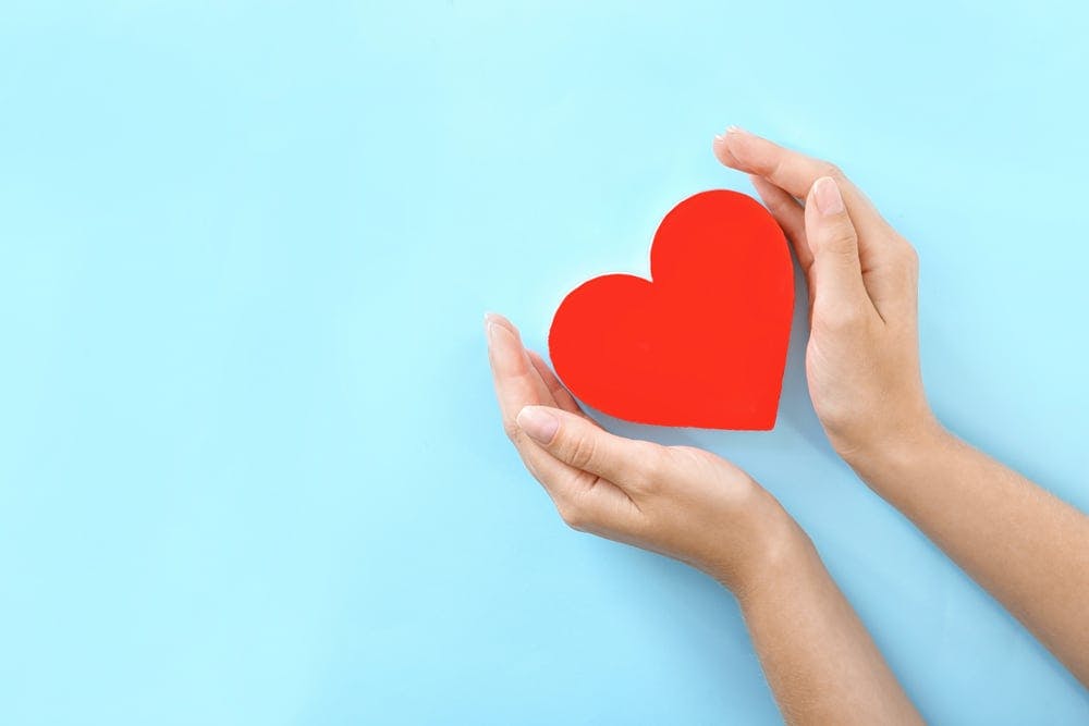 igd-life-insurance-hero-blue-heart-hands.jpg