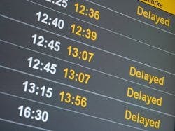 Airport flight-times board showing various flight times.