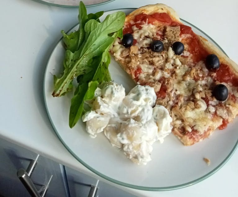 Home-made pizza and salad