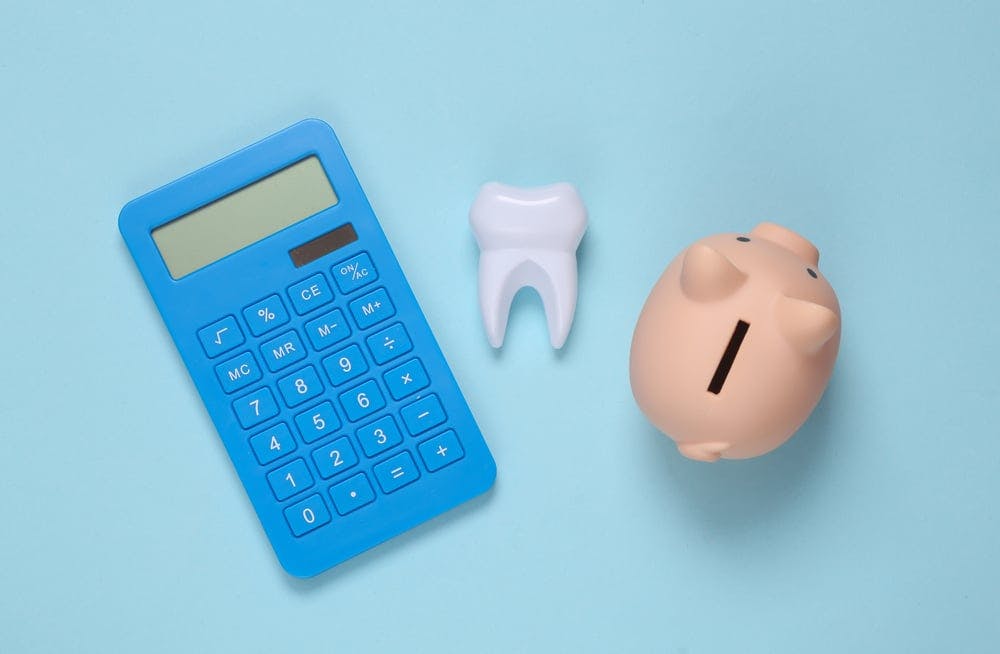 igd-hero-healthcare-cash-plan-piggy-bank-calculator-tooth-dentist.jpg