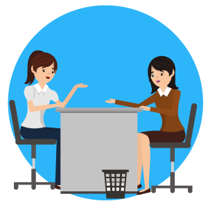 Illustration of two female employees talking over a desk