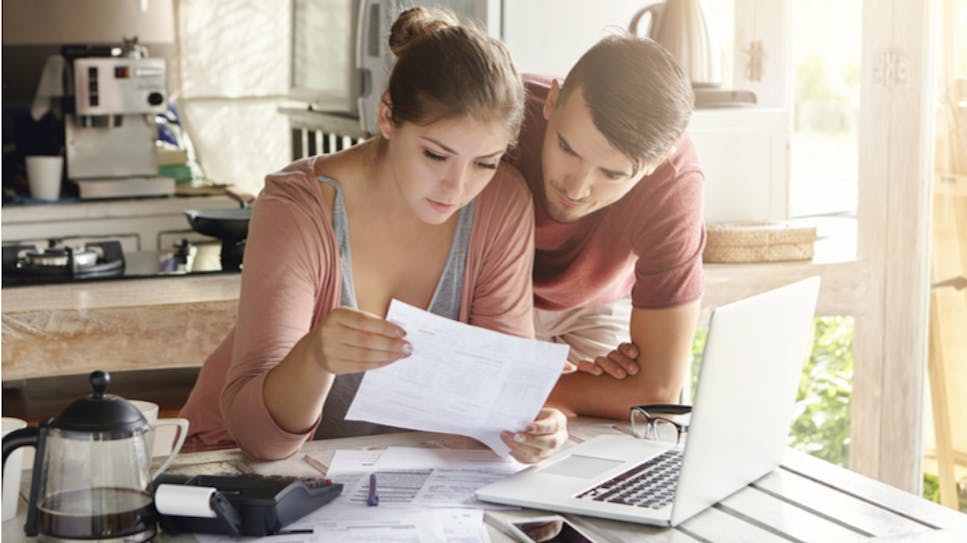 hero-homepage-mortgage-prisoners-couple-laptop-bills.png