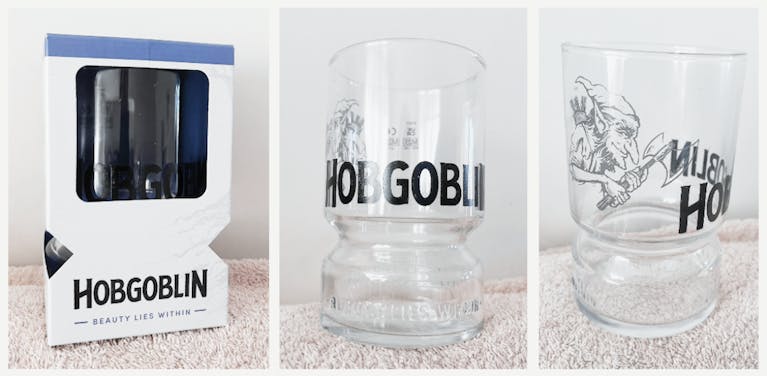 Three images, each from a different angle, of a Hobgoblin-branded glass