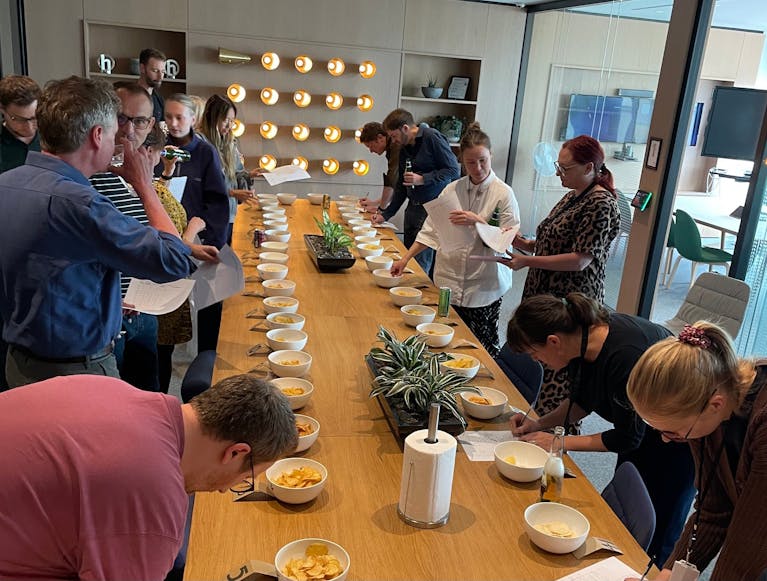 An image of the MSE Team, engrossed in eating cheese 'n' onion crisps.